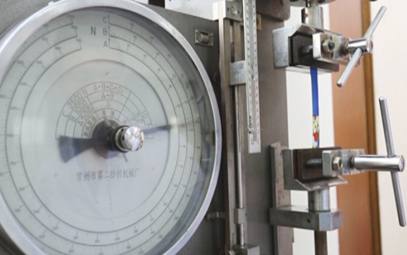 米兰MILAN(中国)暖手宝面料及内膜拉力试验示意图